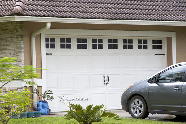 3 Inventive Ways To Brighten Your Home 8217 S Exterior With Paint A Garage Door Painted To Look Like It Has Carriage Details